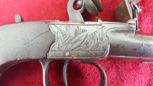 A good English flintlock pocket pistol manufactured by Johnson & Collins. Circa1800. Good condition. Ref 9401.